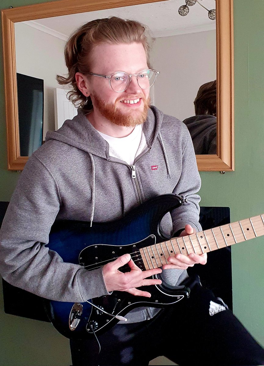My son's with their <a href="/GlarryInc/">Glarry</a> guitar 🎸... had them and my daughter plus two of their partners over on Mother's Day, such a lovely afternoon altogether #family #MothersDay #music