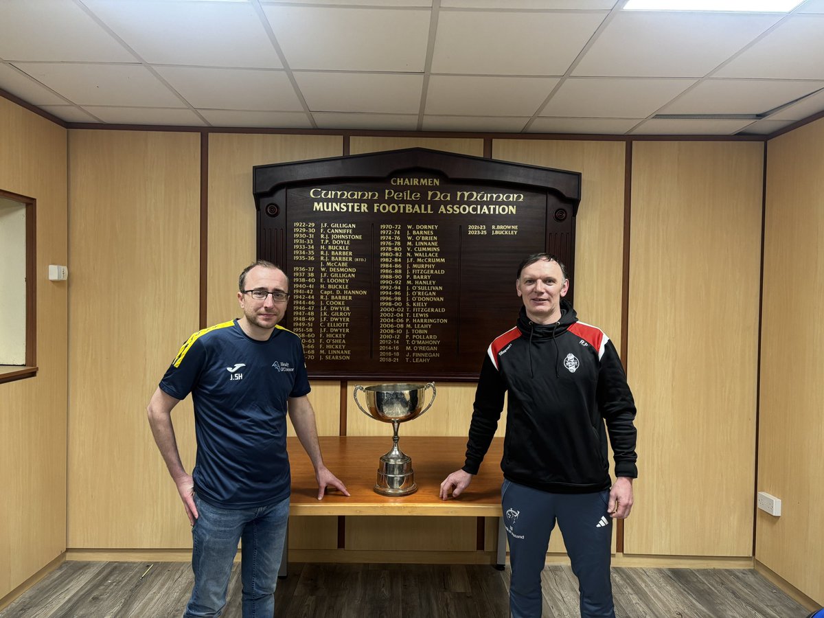 It’s Mick Mooney Cup Final Week.

Pictured at Munster FA HQ is Healy O’Connors John Sheehan and Jay Bazz Manager Ray Foley getting a sneak peak of the cup before this Sunday’s final 🏆