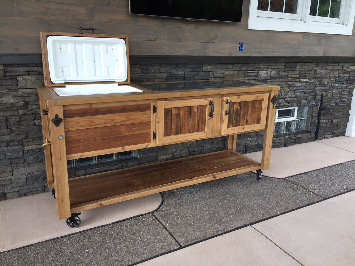 <a href="/HomeDepot/">The Home Depot</a> No more running back and forth to the fridge at your next outdoor party. Our Outdoor Cooler Bar keeps your drinks cold and easily accessible. Who needs a bartender when you have this handy addition? #OutdoorEntertaining #BackyardOasis #EssentialAccessory