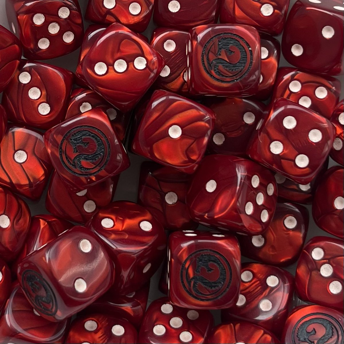 renegadehpg's tweet image. New House Kurita/Draconis Combine dice. The black logo is a bit harder to see but I like the fact that it matches the actual crest. My first run has the ivory logo.
What do you guys think? Does black or ivory have the edge here?