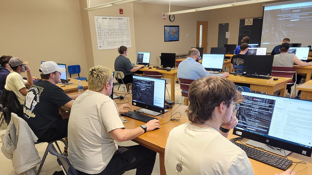 CSC1853's tweet image. Students in Culver-Stockton College (C-SC) Data Analytics Professor Joseph Liesen's artificial intelligence class put their problem-solving skills to the test in an AI-generated virtual escape-room challenge. Congrats to winner, Sarah Pickett-Miller, a sophomore psychology major!