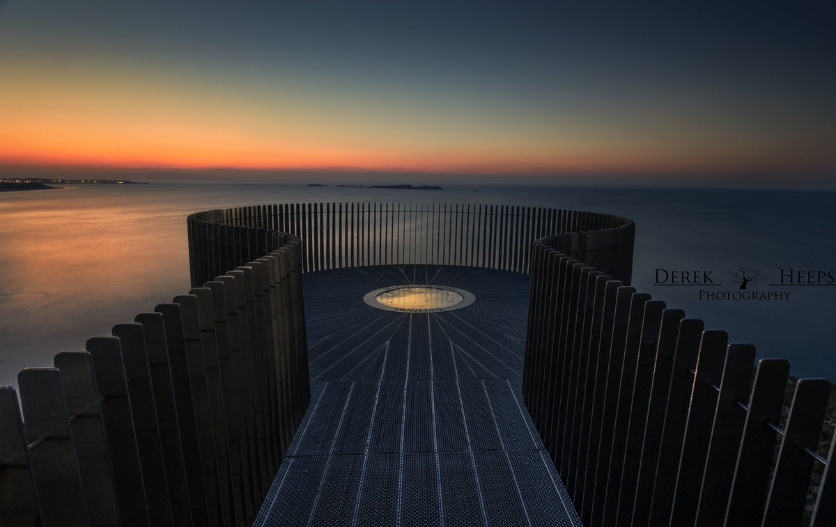 Managed to get Magheracross viewing platform in Portrush to myself for all of 5 minutes during a glorious afterglow shortly after sunset.

It's harder than you think to get the camera lined up correctly with so many lines leading away from the lens!