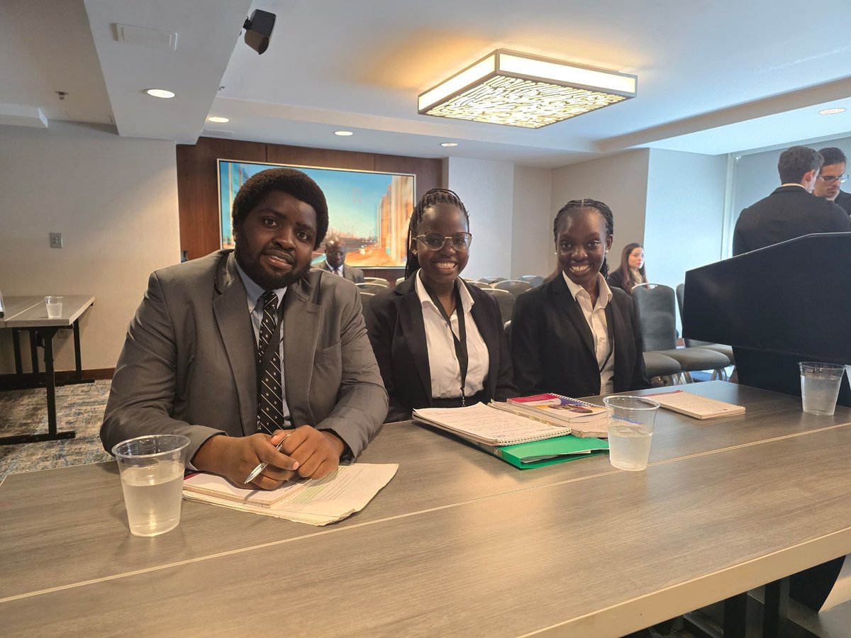 uculaw's tweet image. Preliminary Round 2: Team Uganda takes a photo with the Judges and Team 116 after the 2nd preliminary round as Respondent.