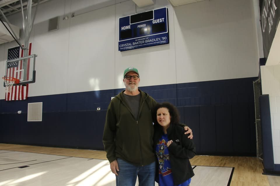 Today we unveiled the Garner Student Rec. Center new scoreboard to Paige and John Bradley in memory of Crystal Baxter Bradley, a 1990 graduate of Lyon College (Arkansas College). Thanks to her Zeta Omega Sisters•Family•Lyon Athletics•many friends who helped make this possible.