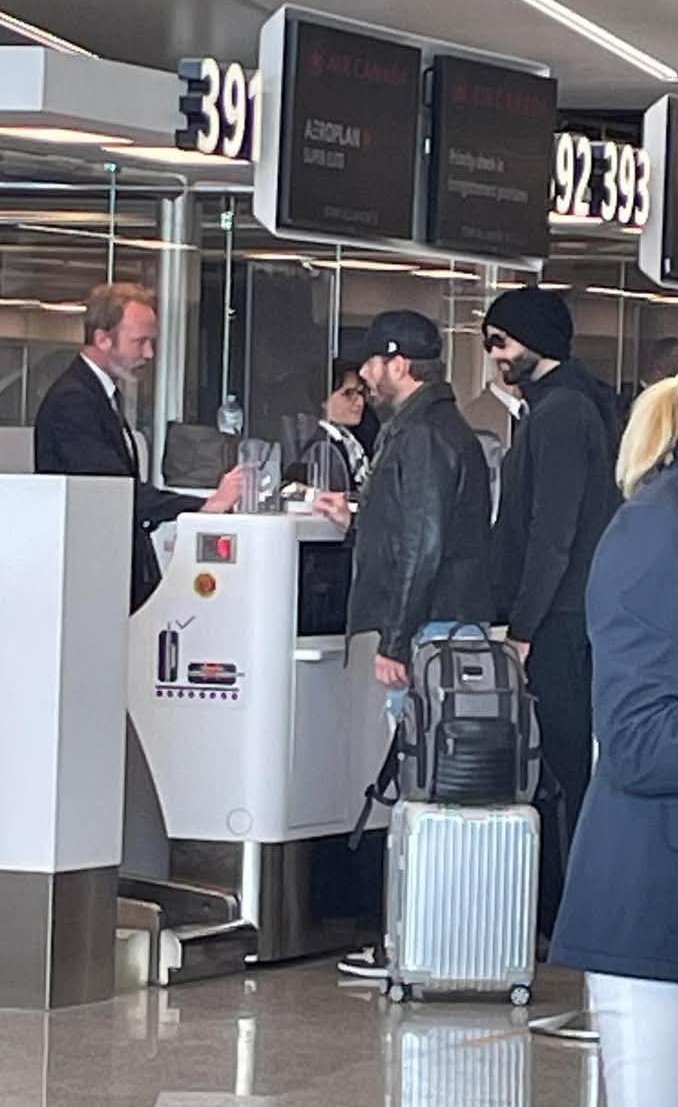 obsessed with the way jensen takes care of the check-in process &amp; jared just looks on like the baby brother he is
