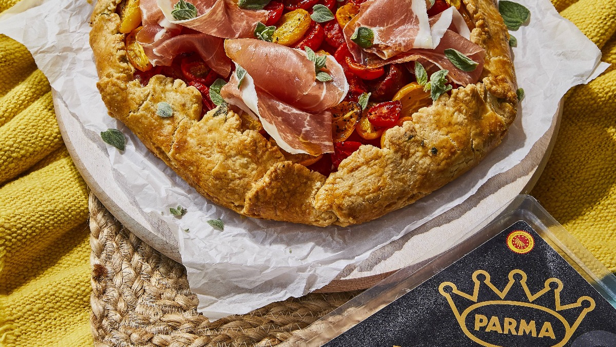 Flaky, savoury, and simply delicious! This heritage tomato, goat’s cheese &amp; #ProsciuttodiParma galette is a slice of perfection in every bite. A mouthwatering twist on classic flavours.