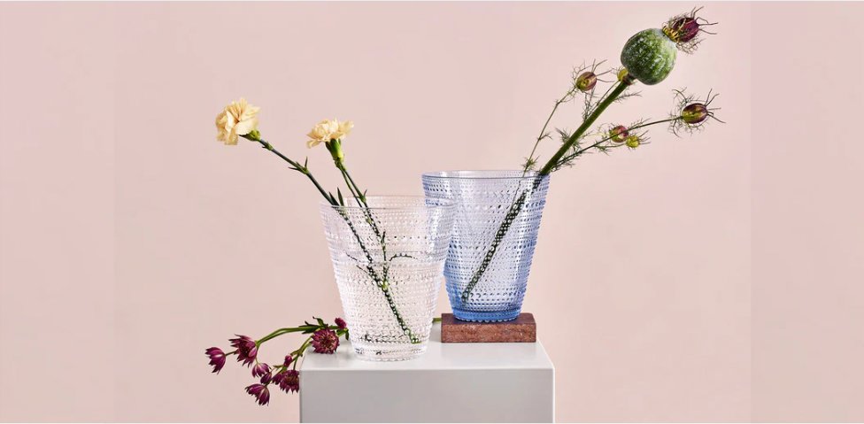 Iittala’s Aalto vases combine vibrant glass colors with a fluid, organic shape, bringing timeless elegance and a touch of nature to any space.
