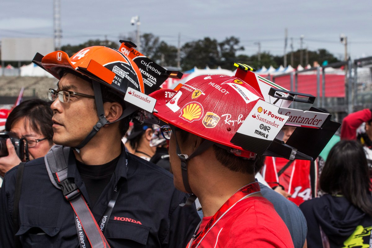 F1's tweet photo. The Formula 1 fans in Japan NEVER disappoint with their creative headwear 🪖

#F1 #JapaneseGP https://t.co/URnnX1QFpr