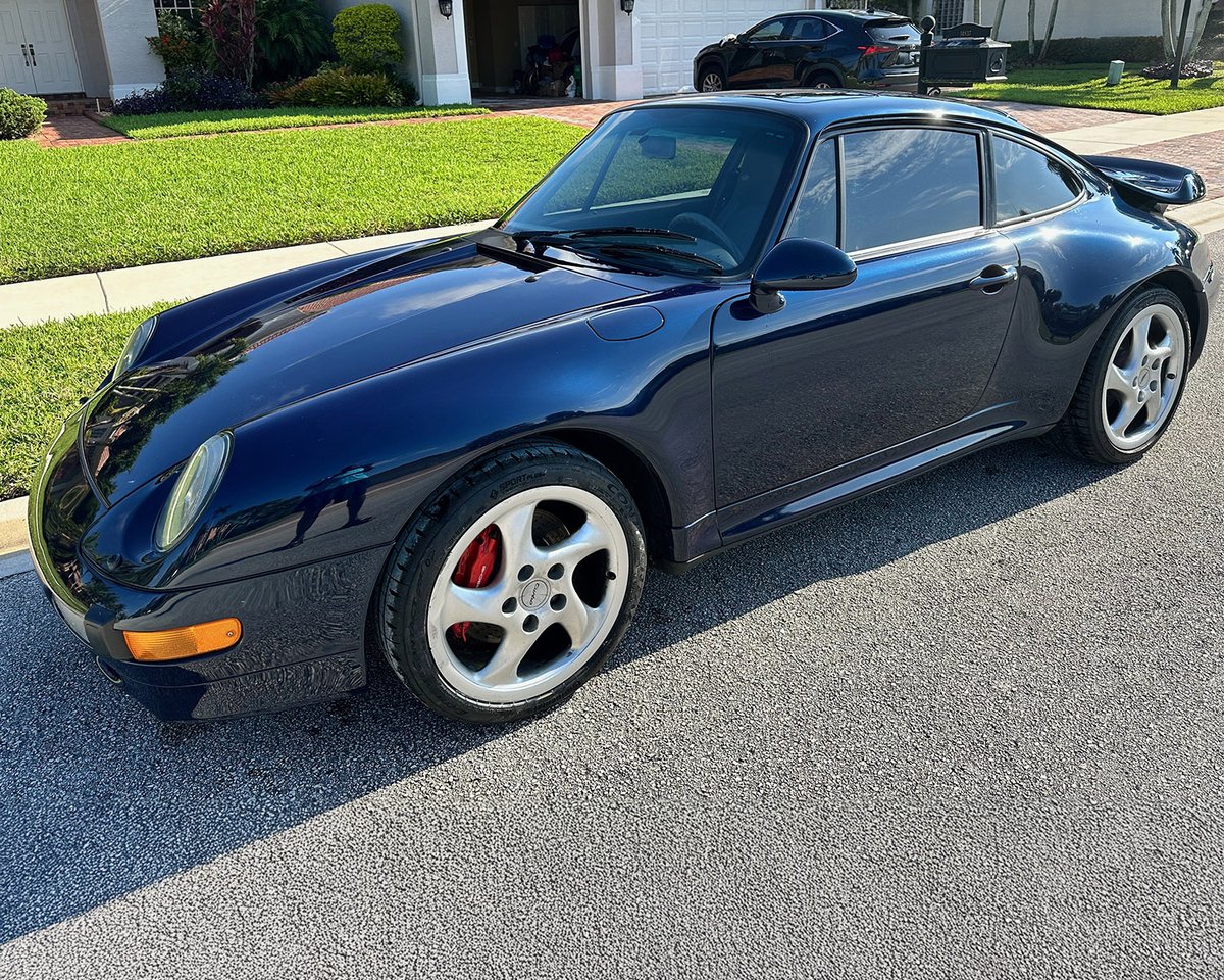 Barrett_Jackson's tweet photo. Iconic performance meets timeless power! This 1997 @Porsche 911 #Turbo delivers 408hp from its #twinturbo 3.6-liter flat-6 engine, paired with a 6-speed manual and #allwheel drive for a #thrilling ride.  

Read more: https://t.co/6t5cdhNJj2 https://t.co/NVS8n7MnoN