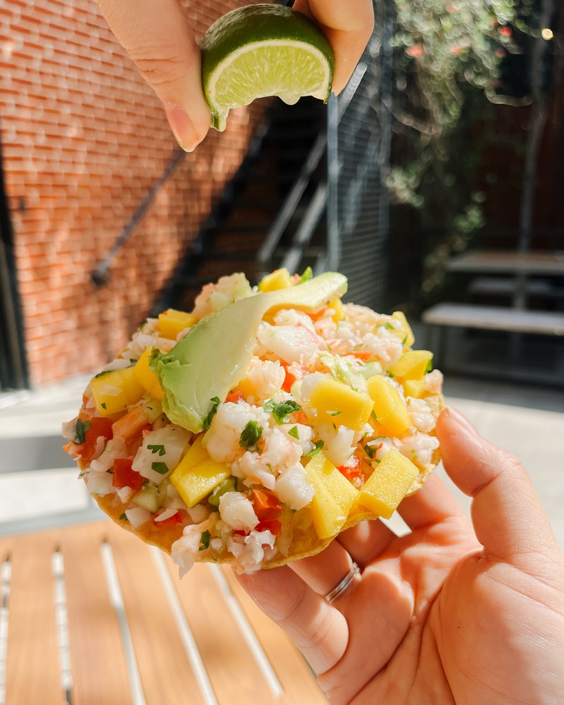 Brighten up your day with Birrieria El Rancho's Ceviche Tostada! ☀️ Packed with shrimp, crab meat, onions, cilantro, tomato, cucumber, and a squeeze of lime, it’s the perfect bite to bring on the sunshine!

#ParlorVibes #EatOKC #DrinkOKC