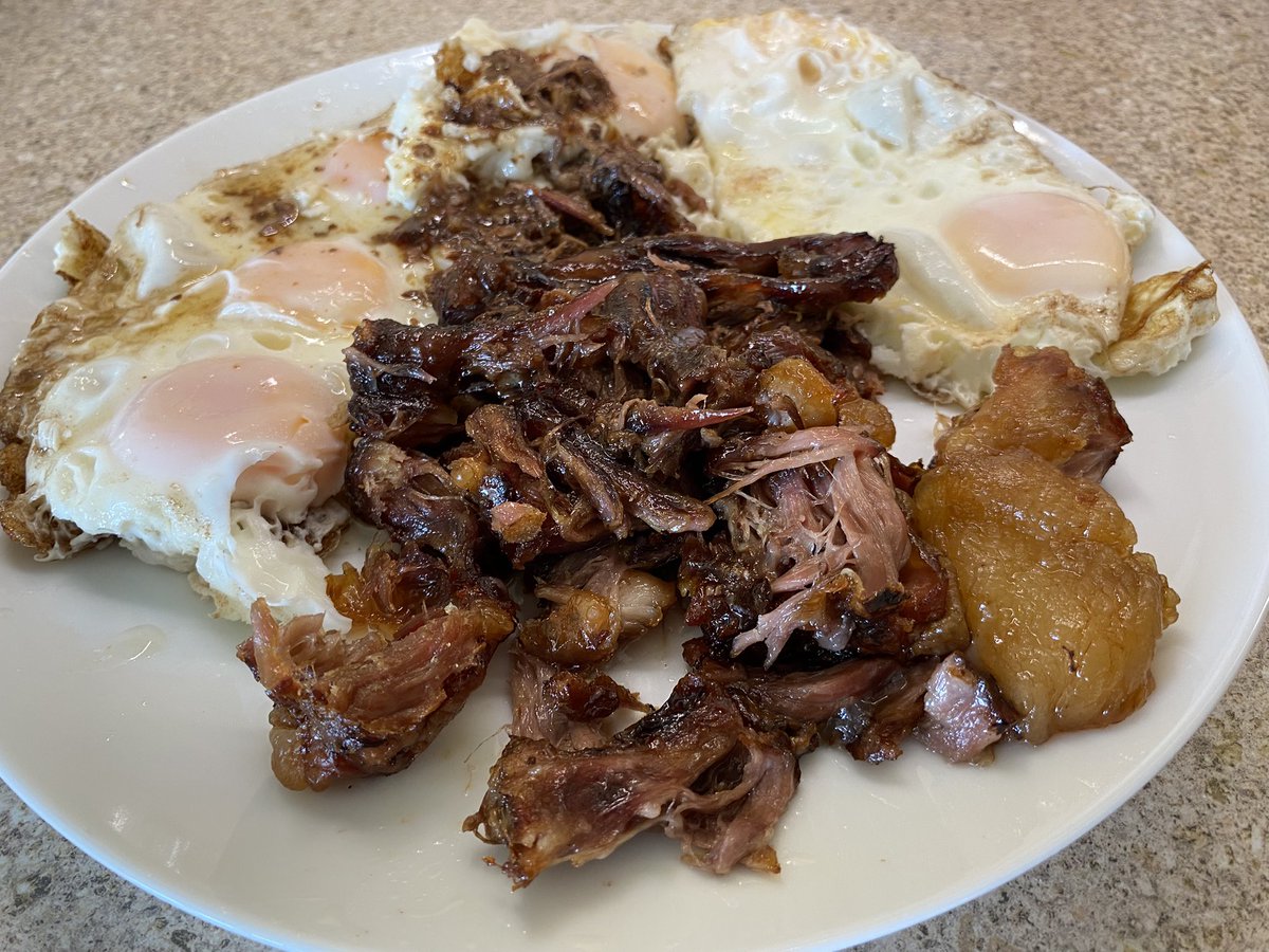 Lifeheuristic's tweet image. Shredded slow-cooked oxtail with eggs. Not pretty but very tasty.