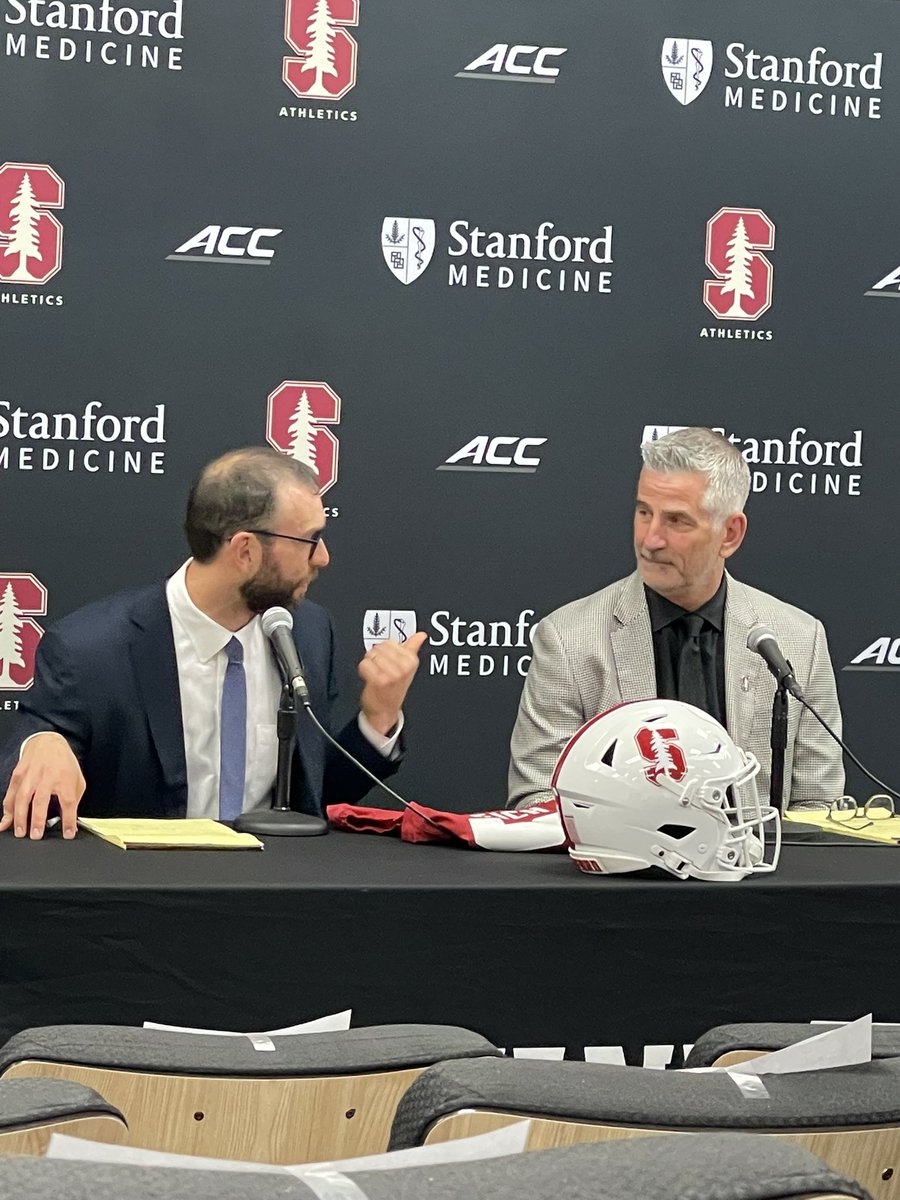 Andrew Luck introducing Frank Reich as the interim <a href="/StanfordFball/">Stanford Football</a> coach. Said his former coach at the Colts was his very first call. Frank married Andrew and his wife Nicole.