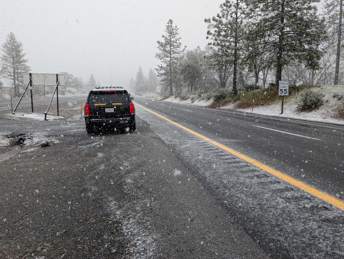 Snow on State Route 108 at Soulsbyville Road. Carry chains with you as the snow levels are dropping.