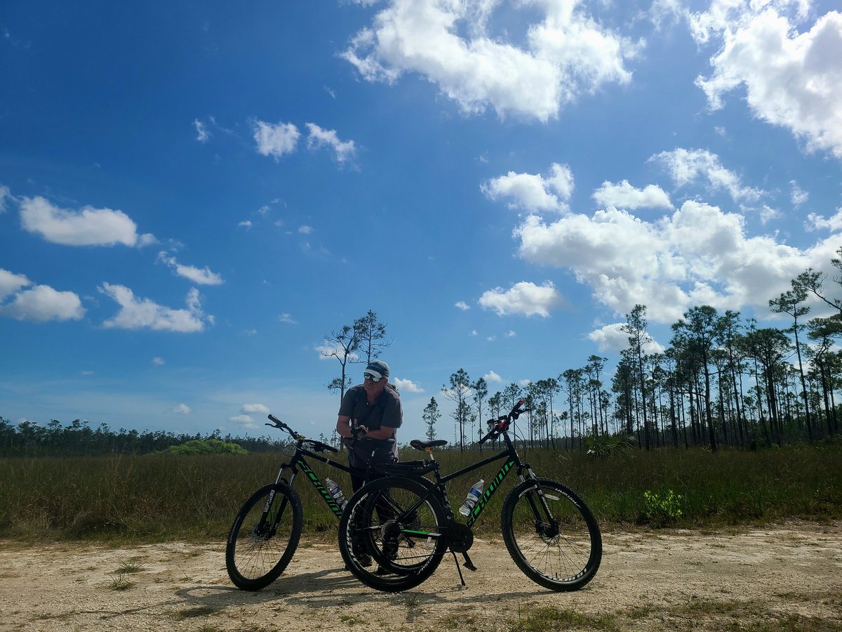 UpandGo23's tweet photo. Moody clouds over the Everglades today 🚲🚲 https://t.co/j8ehvHXdUK