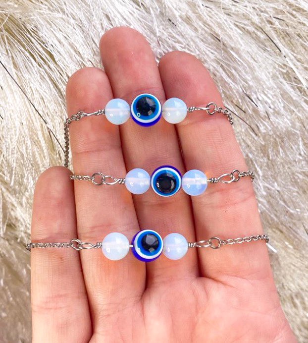 LiveeintheLight's tweet photo. ✨

✨

✨

🧿🌟 opalite x evil eye chokers are making a comeback 🌟🧿 https://t.co/3GaSosrzfH