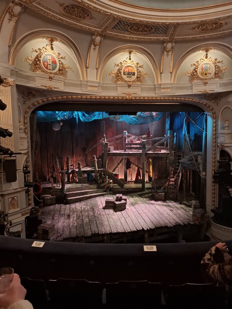 SamanthaWrapson's tweet photo. Another delightful midweek double show day! First a return visit to @TCCOBBmusical, which is no less heartwrenching the second time round and has only made me more desperate for a full cast recording. Also found this tea cosy in the Ambassadors and I'm obsessed 🧡 https://t.co/IxsBk2WWup