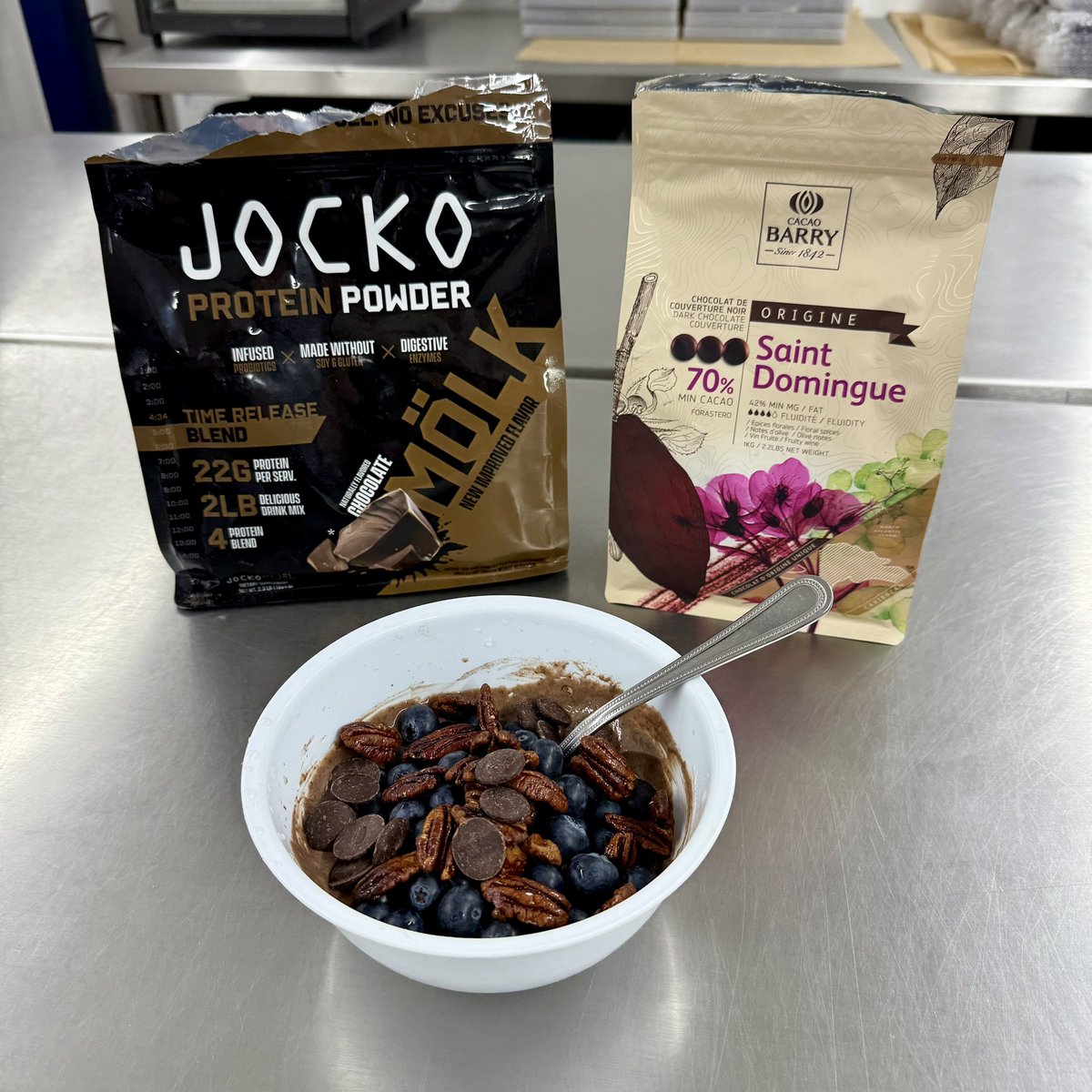 Breakfast of champions! Yoghurt, blueberries, pecans, 70% dark chocolate and a scoop of Molk! Get some! <a href="/jockowillink/">Jocko Willink</a>