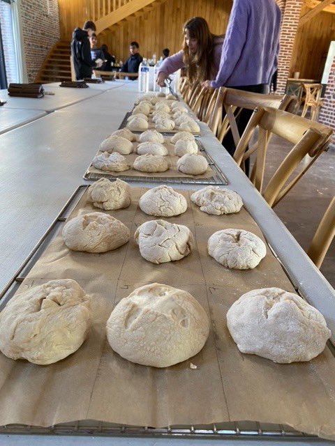 UCSModLangs's tweet image. After breakfast this morning, they tried their hand at traditional breadmaking and embarked on a treasure hunt in teams, also involving some archery!