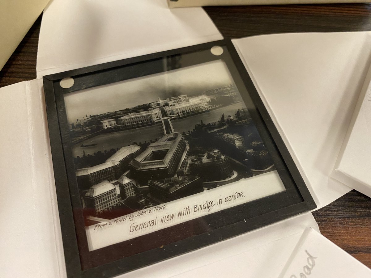 thorparchiveaub's tweet image. One of the glass plates of the 1930 Charing Cross Bridge model, being carefully cleaned and catalogued.