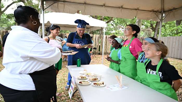 GSCTF's tweet image. "A burrito supreme. Pineapple crumble cake. Nachos. These are pretty straightforward dishes to make, but try doing so in an outdoor setting with several dozen tween girls competing for a prize." Read more about our Cast Iron Chef event via @WPLGLocal10 at: ow.ly/vvfZ50VsH7B