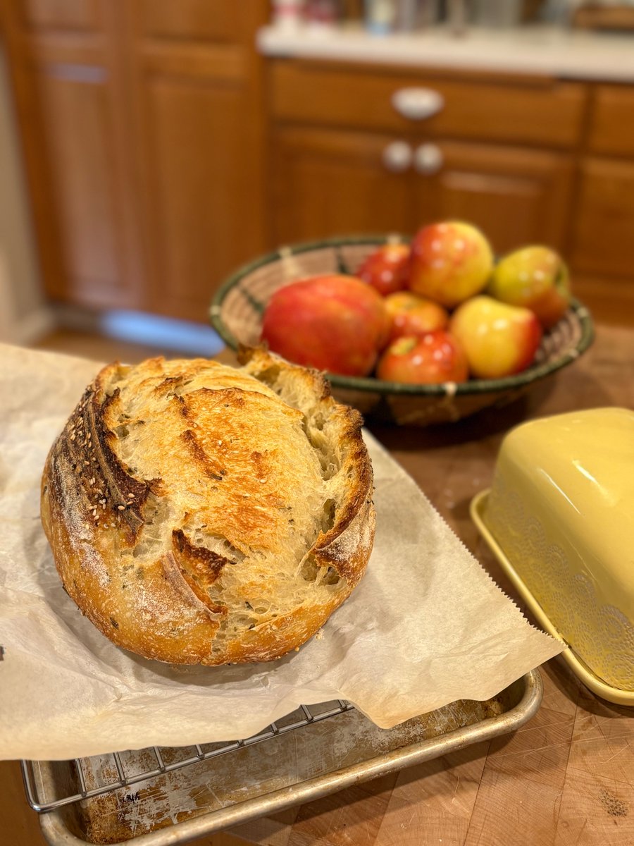 GrumpyAssPug's tweet image. Everyday is a baking day, actually
I'm working on my scoring.  I'm messing up on this.  But...looks aside, this is amazing.  Fresh rosemary and chives from my spring garden.  Sesame seeds for flair.
@SourdoughWeekly