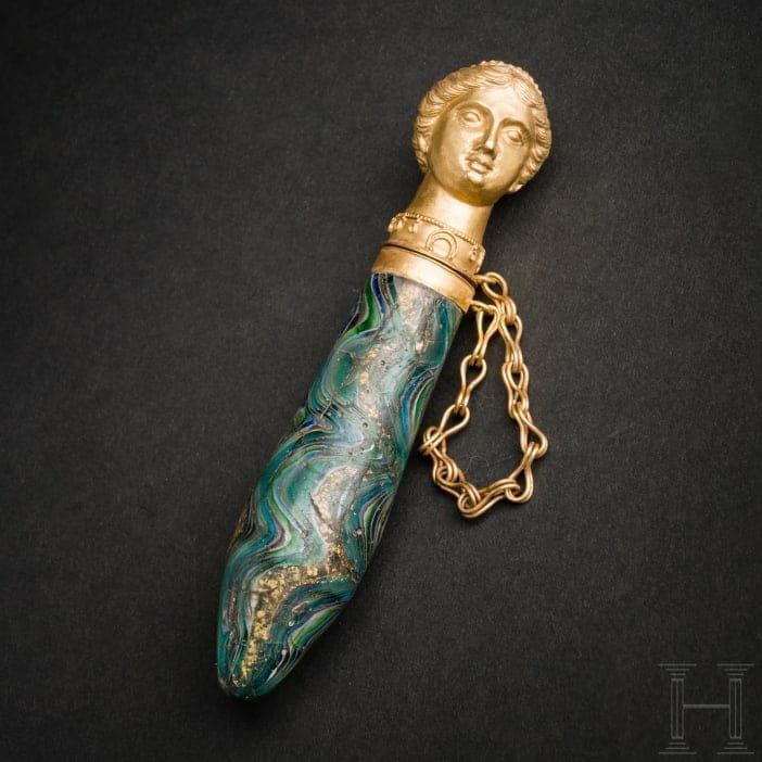A Roman perfume bottle with figural gold lid - 1st century AD. https://t.co/L6glHmmETR