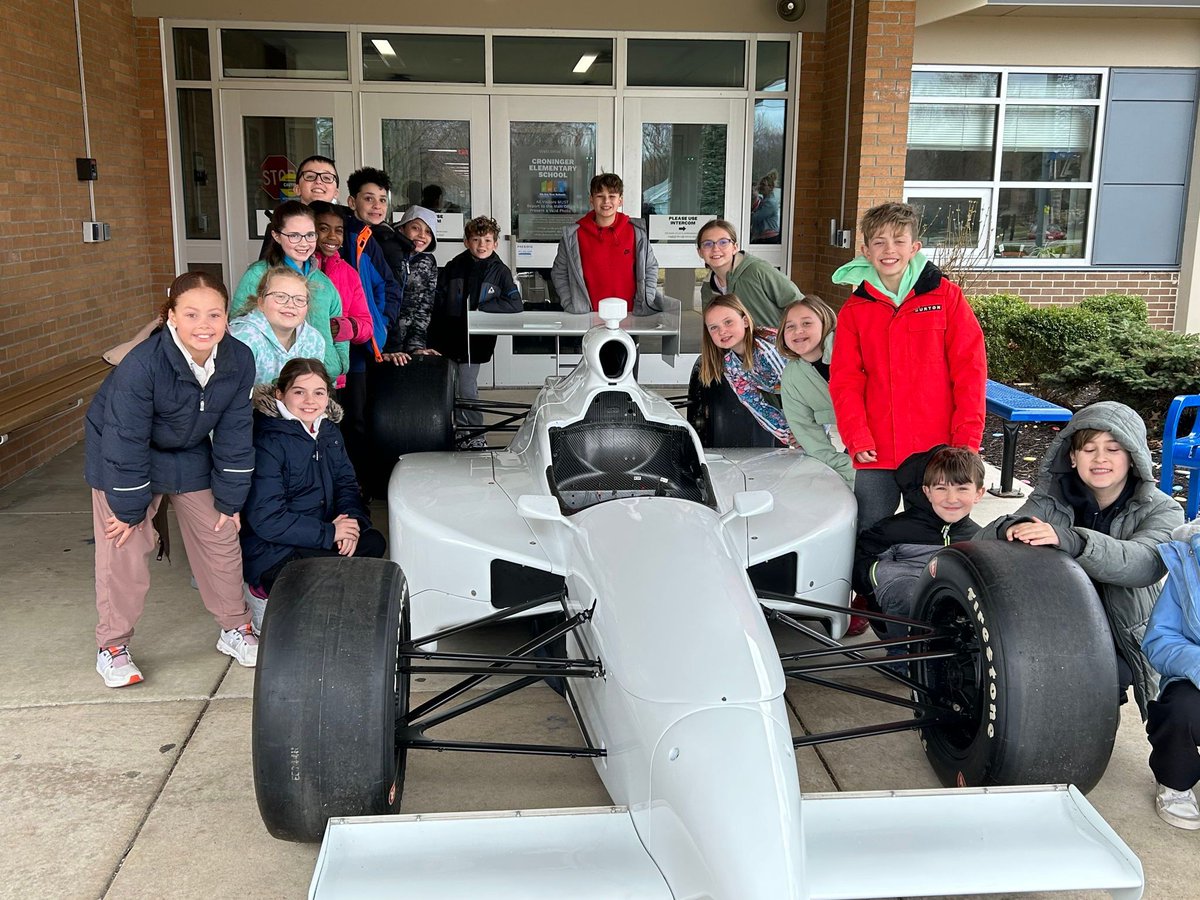 FWCommSchools's tweet photo. #Croninger Elementary 4th graders had a visit from the Indy 500 Festival which brings the fun and pageantry of a field trip to the track to the classroom. This included interactive stations led by @500festival staff & volunteers, racing equipment, & an actual Indy Car. https://t.co/JCyUFSaTPm