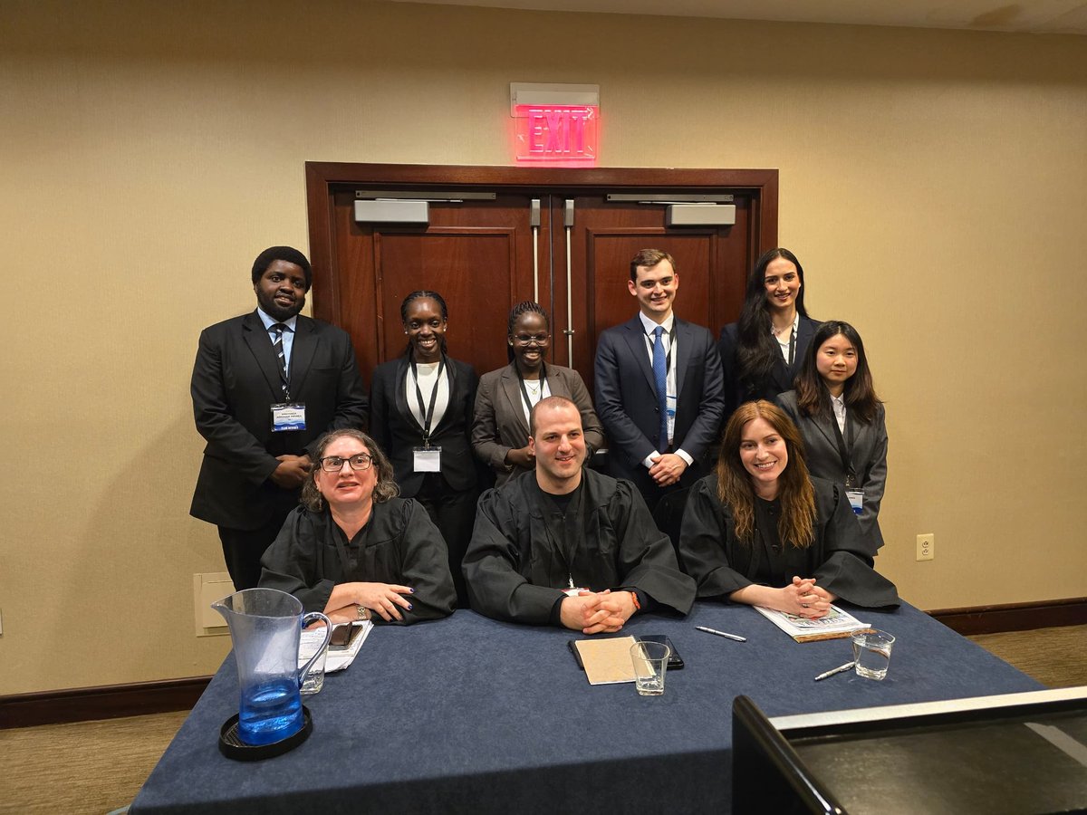 uculaw's tweet image. Preliminary Rounds 3: Team Uganda takes a photo with the Judges and Team 766 after the 3rd preliminary round as Applicant.