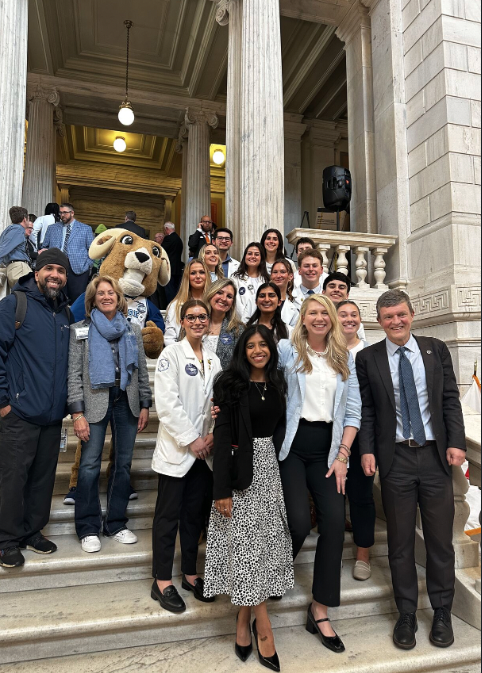 URI_Pharmacy's tweet photo. Honored to be part of 'URI Day' at the Rhode Island State House! Our students, faculty, and staff are advancing healthcare through education, research, and patient care. We're committed to improving health outcomes across the Ocean State and beyond! 🌊💙 #GoRhody #URxI https://t.co/m7Uyt0x6EM