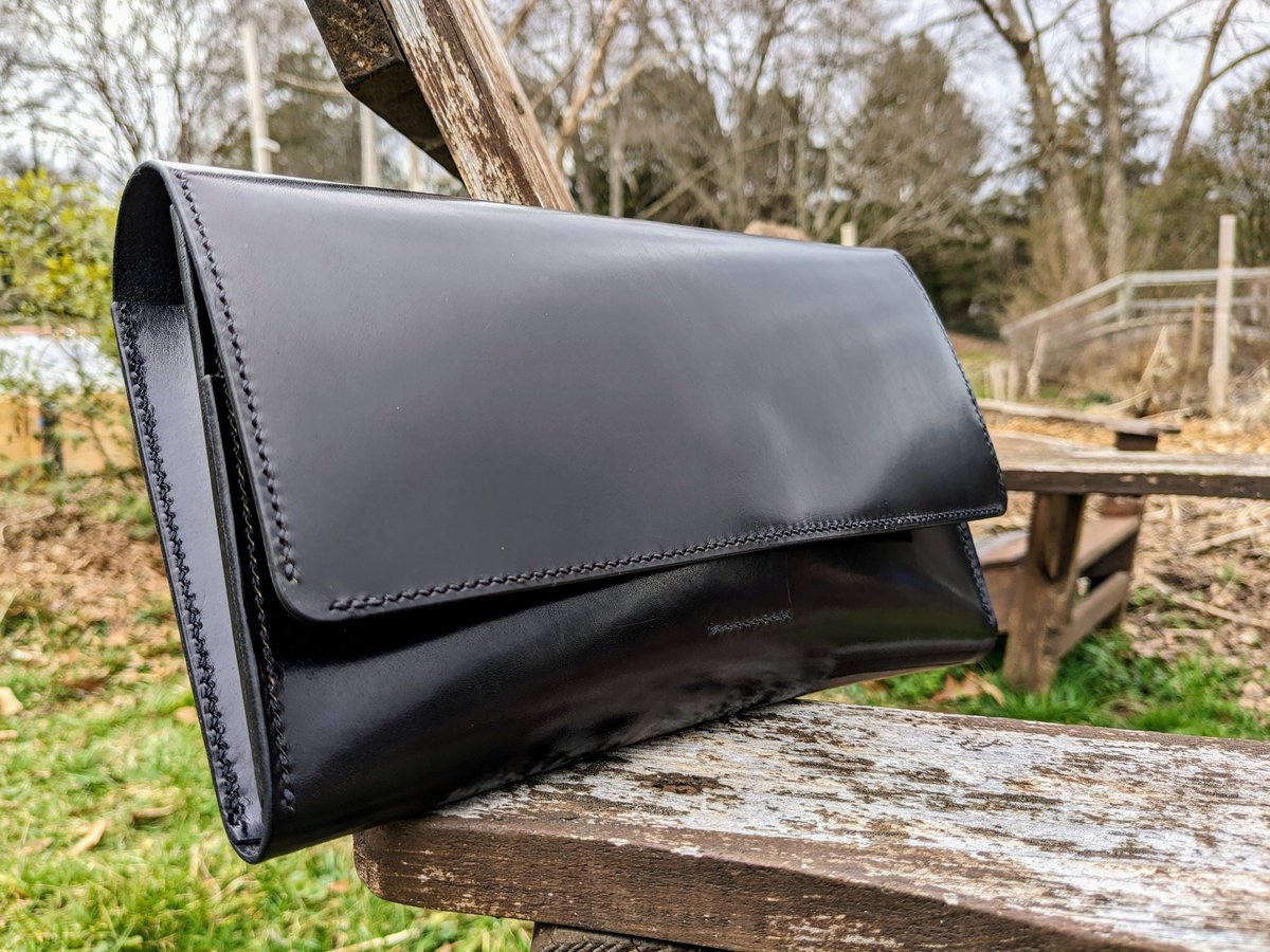 flyingmonk_lg's tweet image. Italian leather clutch, which I made for my darling wife. I've since moved away from the high gloss resin finishes usually, but man that shine is something else. Reminds me to experiment with carnauba wax, which is the hardest natural wax (and thus the shiniest).