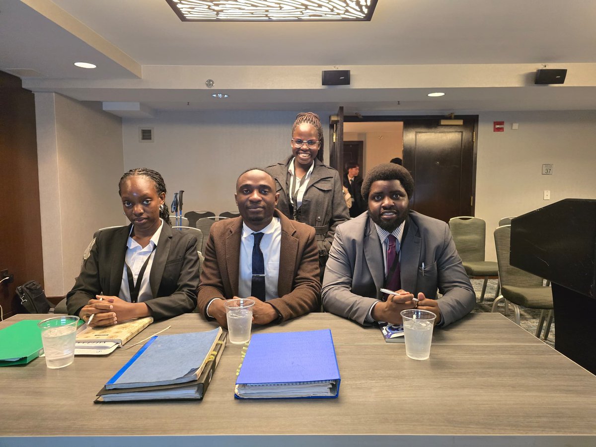 uculaw's tweet image. Preliminary Rounds 4: Team Uganda takes a photo with the Judges and Team 317 after the 4th preliminary round as Respondent at the JESSUP moot in the Washington D.C.