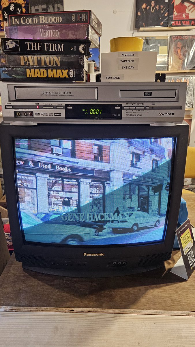Walking into this old school record store brought back memories. Old-school Panasonic TV. DVD player with a VHS combo. VHS movies stacked up on deck. This is what it looked like at my parents' house in the '80s; I was in heaven, mesmerized by a Gene Hackman performance.