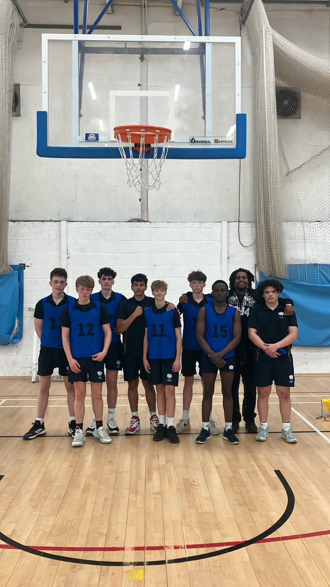 Year 10 &amp; 11 basketball team and coach Remy at their fixture v Spires