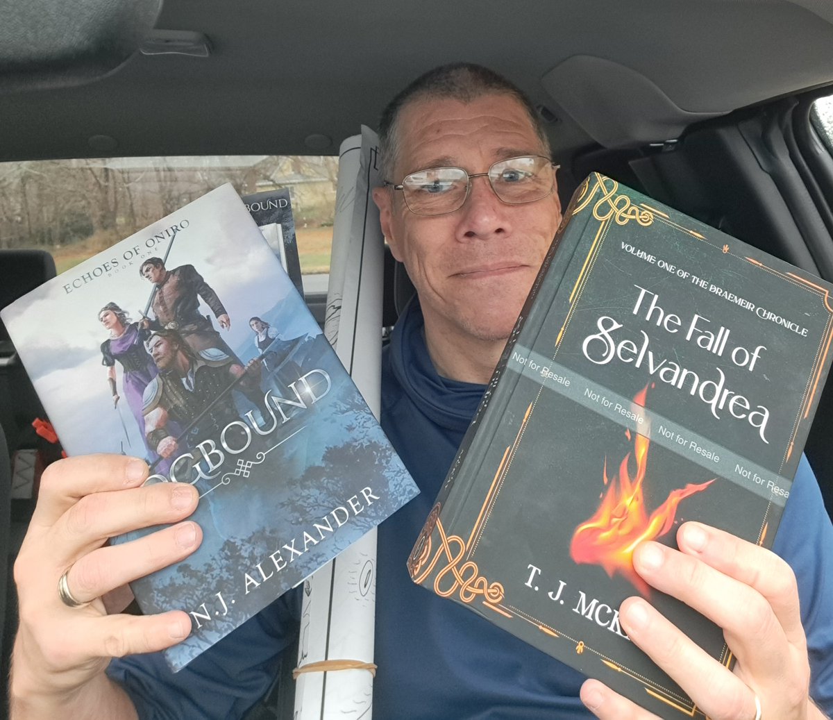 Glenn_sccc's tweet photo. @Nick_A_Writes @timmckay52 @elven_scribe Won books and a poster, back to back, so only fair to post both books in a car selfie!
Thanks all!
#supportindieauthors
#nocabal #spfbo https://t.co/GuihHQ37Wv