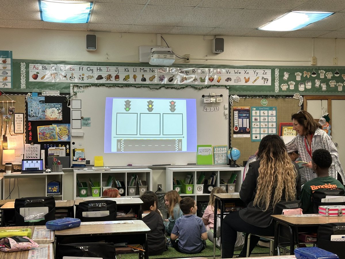 Ms. Kenna and her students trying out race car blending boards from the Voices of Literacy and Languages April resources 🎉 Way to go, Ms. Kenna!