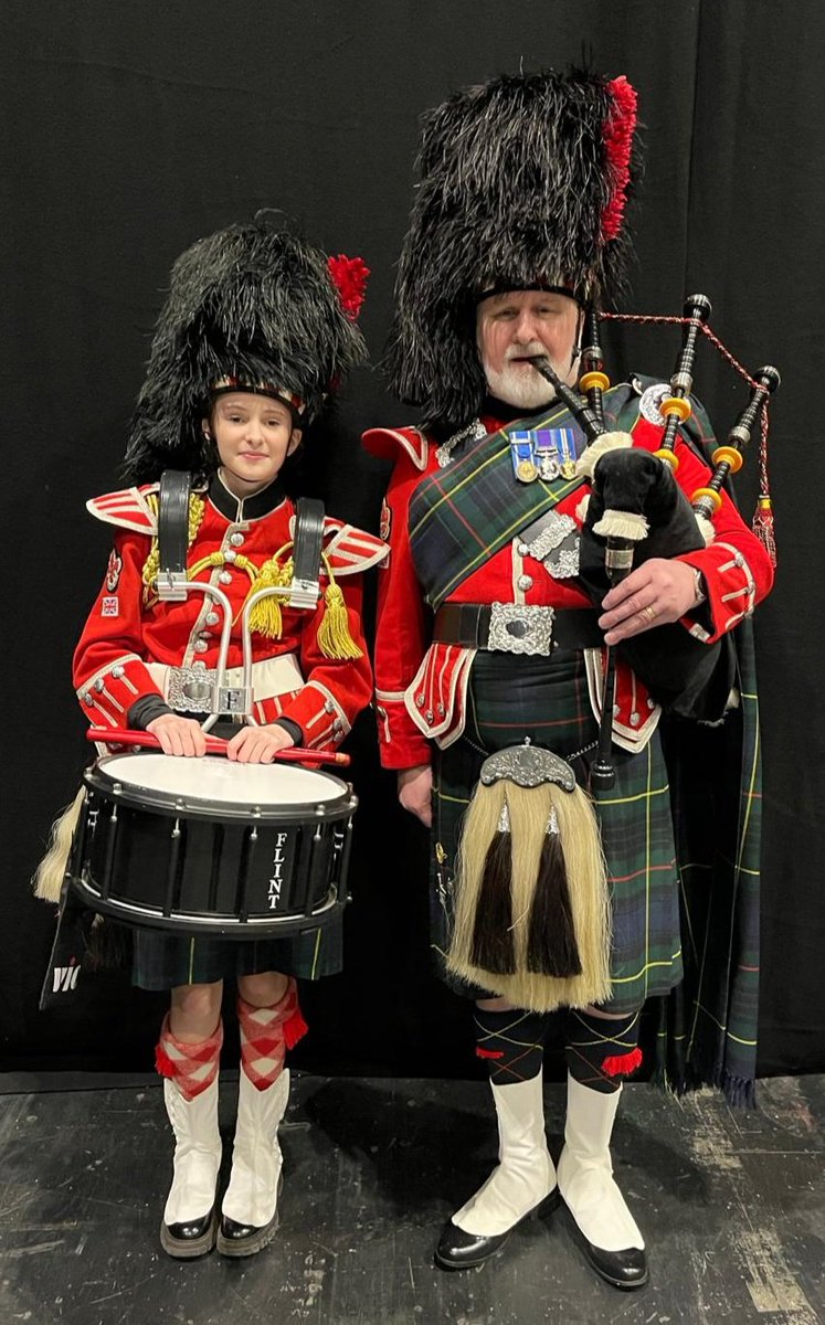 This is a commission artwork drawing that I got done from a photo taken at this years Birmingham International Tattoo, of Amelia and me. I think it is a great memorable drawing of Dad and daughter, enjoying playing with Shirley Pipe Band at the Birmingham International Tattoo