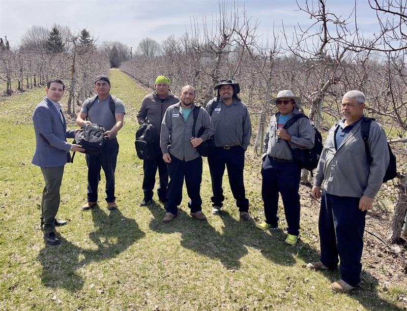 TeamworkMWSP's tweet photo. TeaMWork joins the Consulate of Mexico (@Consulmexlea) for a second farm visit today!

We visited with more workers who support the wine industry in Essex county. We distributed TeaMWork backpack kits, complete with cold and warm weather gear, safety vests, pens, and planners which also include information about workplace rights and community supports.