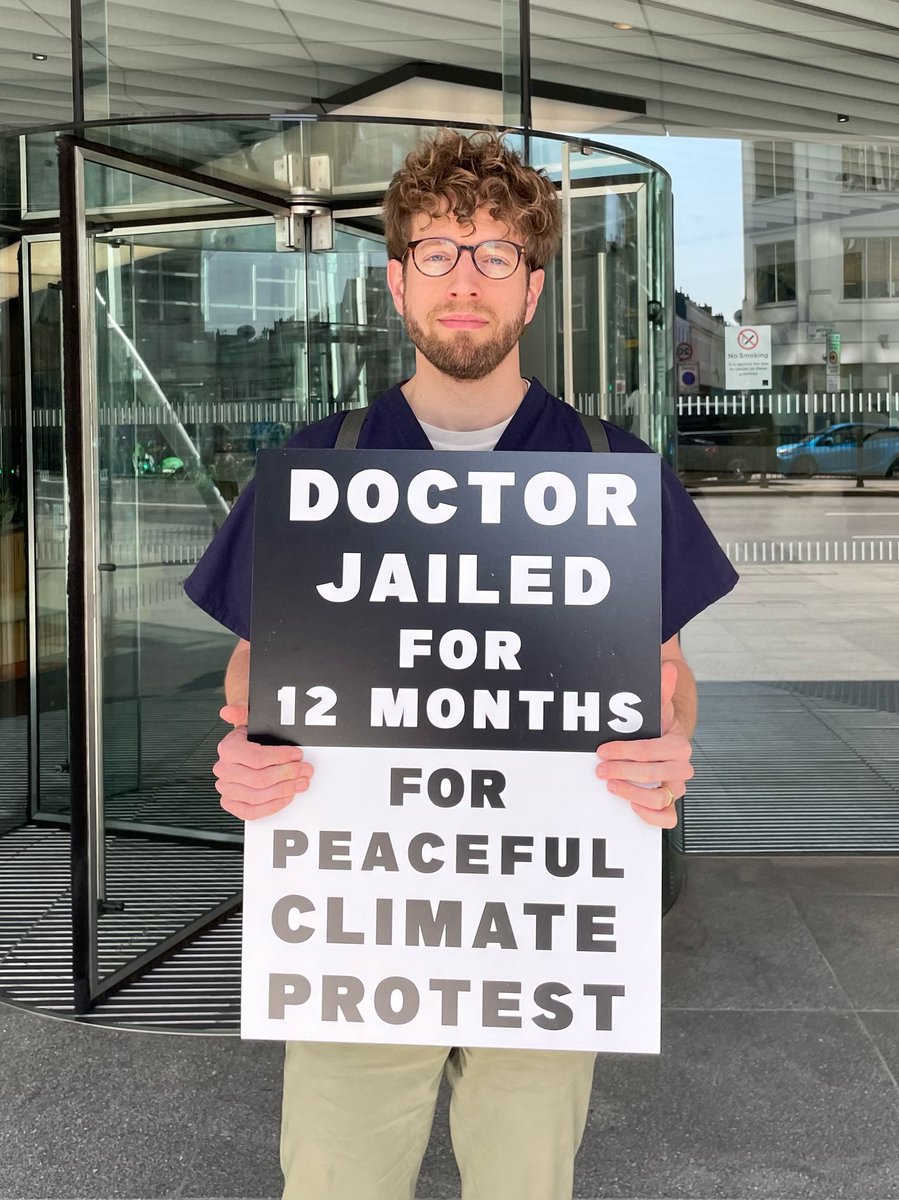 We continue into Day 7 of our vigil in support of Dr Patrick Hart outside the <a href="/gmcuk/">GMC</a> offices in London today. The <a href="/gmcuk/">GMC</a> is not only failing in its duty to protect patients from the climate emergency but is persecuting those doctors who do take action - tinyurl.com/248x3mxv