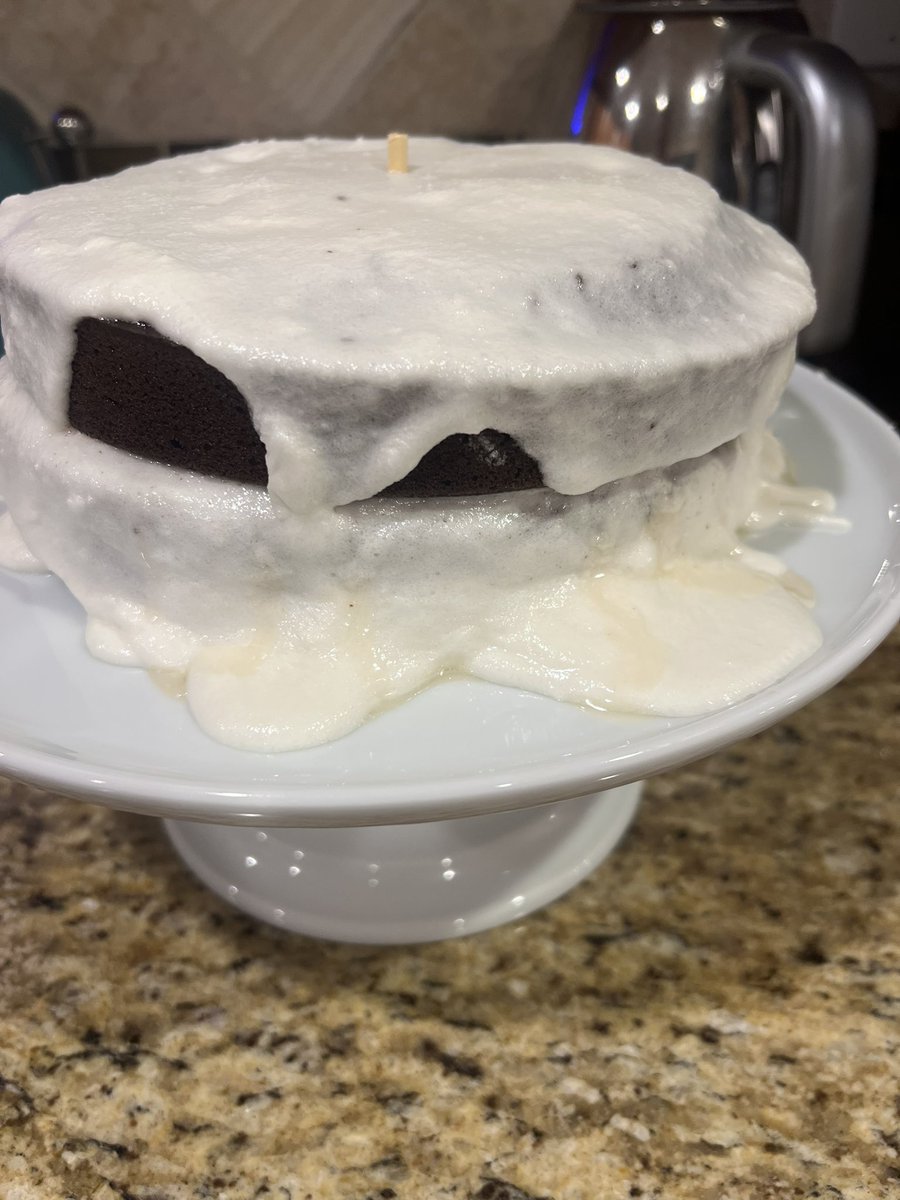 What am I doing wrong with my frosting <a href="/guarnaschelli/">alex guarnaschelli</a>? This is the dark chocolate mayo cake with vanilla frosting from #TheHomeCook. I let the frosting come up to 140 but it never fluffs up and stays grainy.
