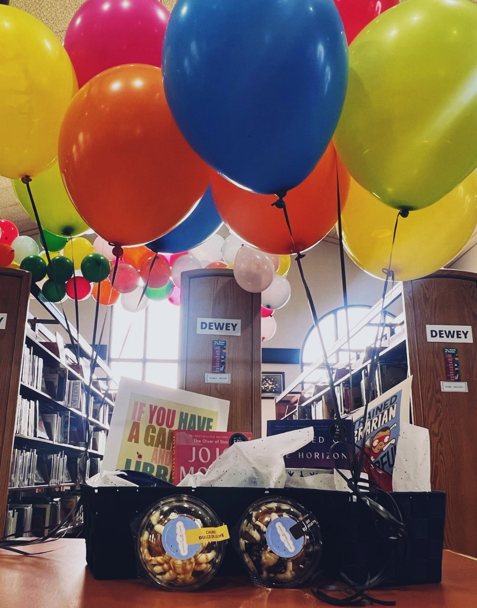 DVHSLibrarian's tweet photo. Thanks @VHairston_DVHS @LRocha_DVHS @DVHS_AP_DrB and all the admin team for showing me and @Mrs__Veee some love for #schoolLibrarianday and #libraryworkerday. I LOVE my book, yum churro cake, cool cup, and snacks. Honored to be @DVHSYISD @YISDLibServices https://t.co/9FKcNQ5YCD