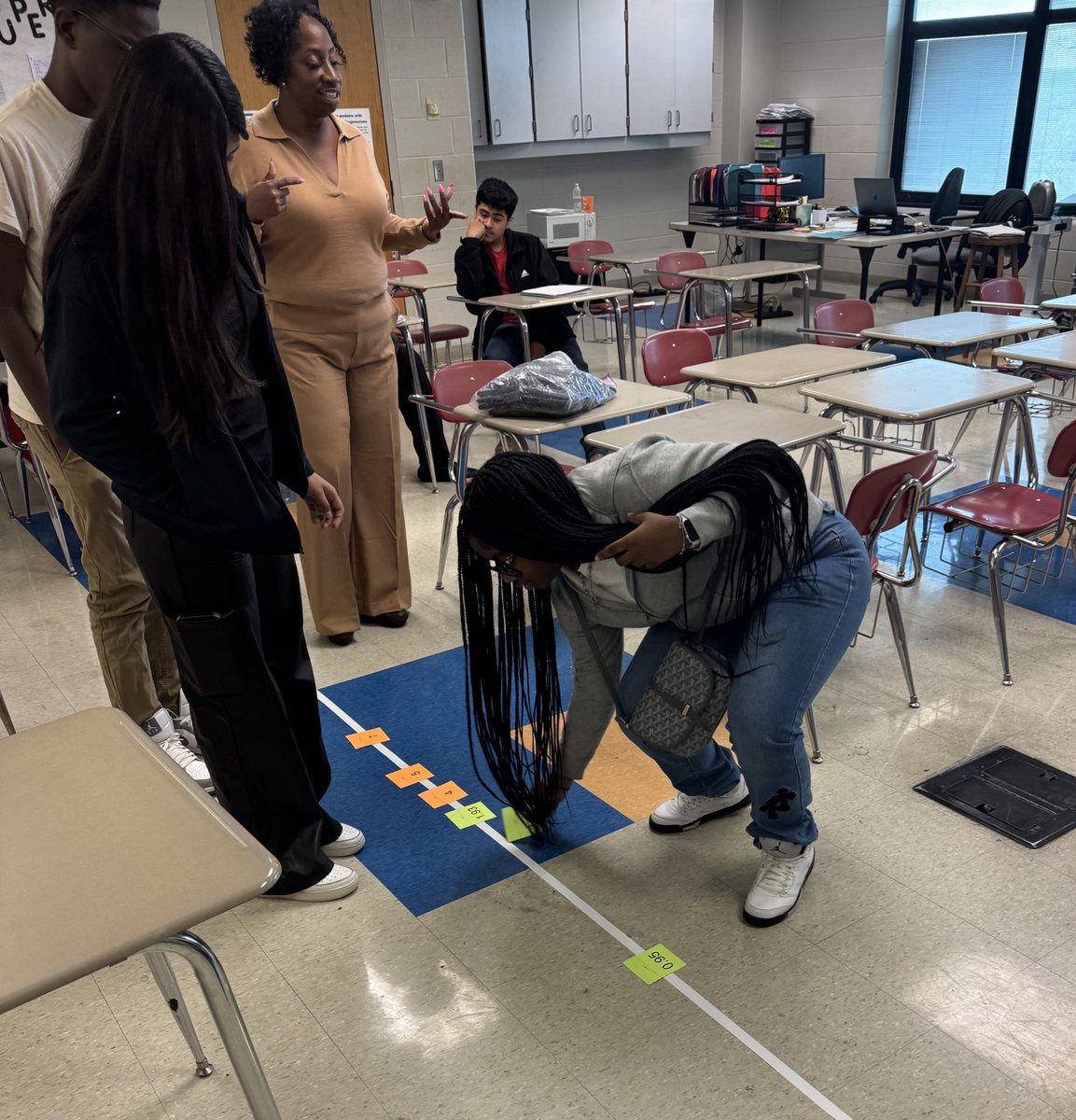 Mr. Moore from <a href="/AMSTIUAB/">AMSTI-UAB</a> works with Ms. Byrd’s math students at Carver High School on one of the High Yield Routines from last month’s PLO.  An interactive number line gets everyone out of their seats and learning! <a href="/AMSTI4all/">AMSTI</a> <a href="/AlabamaAchieves/">Alabama State Department of Education</a> #studentengagement