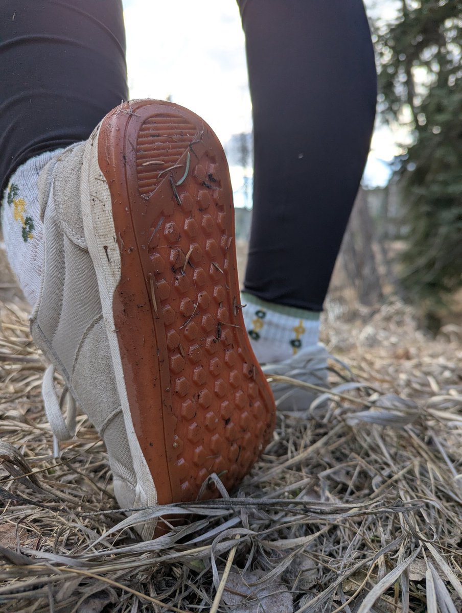 Showing off the bottom of my shoe. It's like a climbing wall for you tinies!