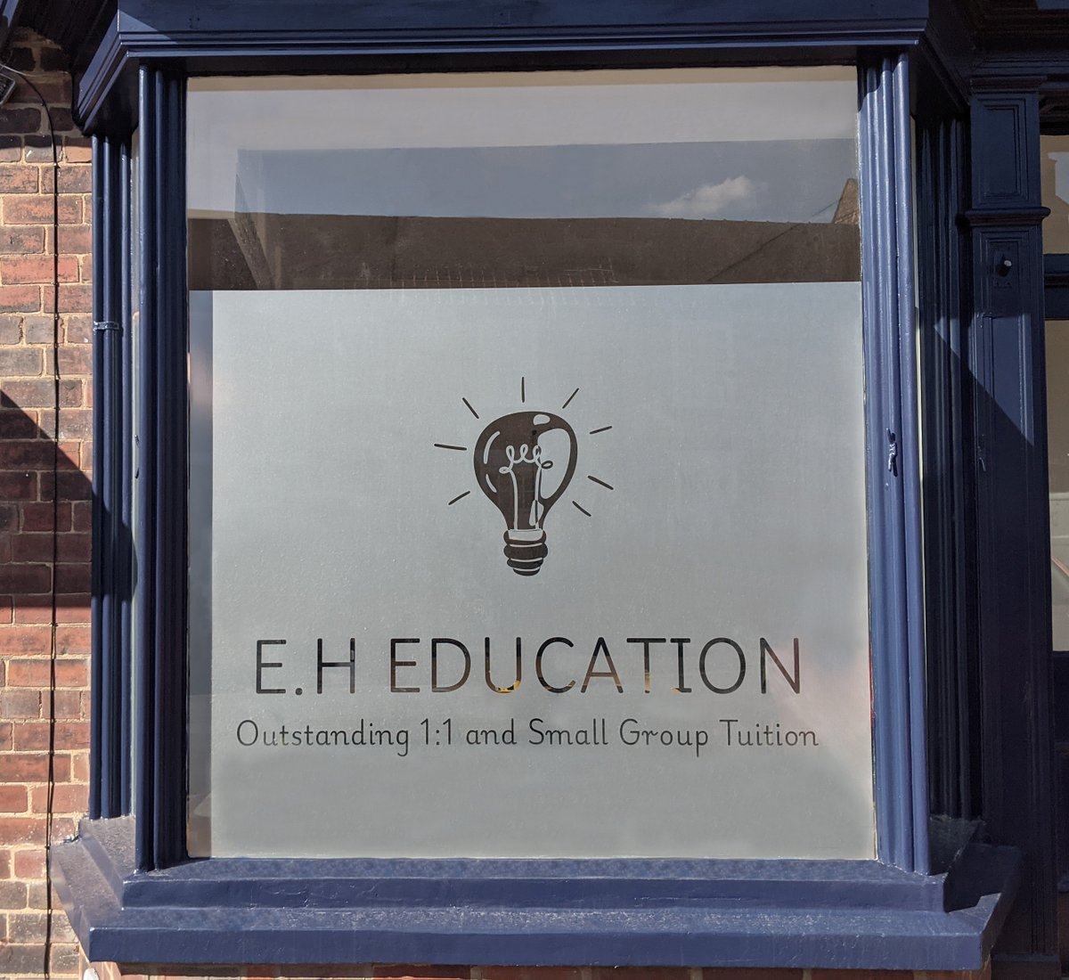 Sleek, professional, and practical!  We installed this custom window frosting for E.H Education—perfect for privacy while enhancing brand image. Want bespoke window graphics? Call us at 01904 400800! #SignageSolutions #windowfrosting #businesssigns