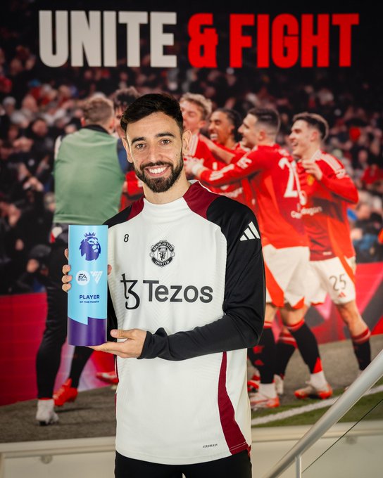 Bruno Fernandes poses with the March 2025 Premier League Player of the Month award.