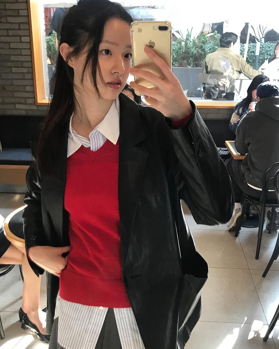 Wrapped in my favorite mix of preppy and edgy today. Call it a red sweater, an oversized blazer, a pleated skirt, and my trusty boots. Yup, ready to stroll down the town!