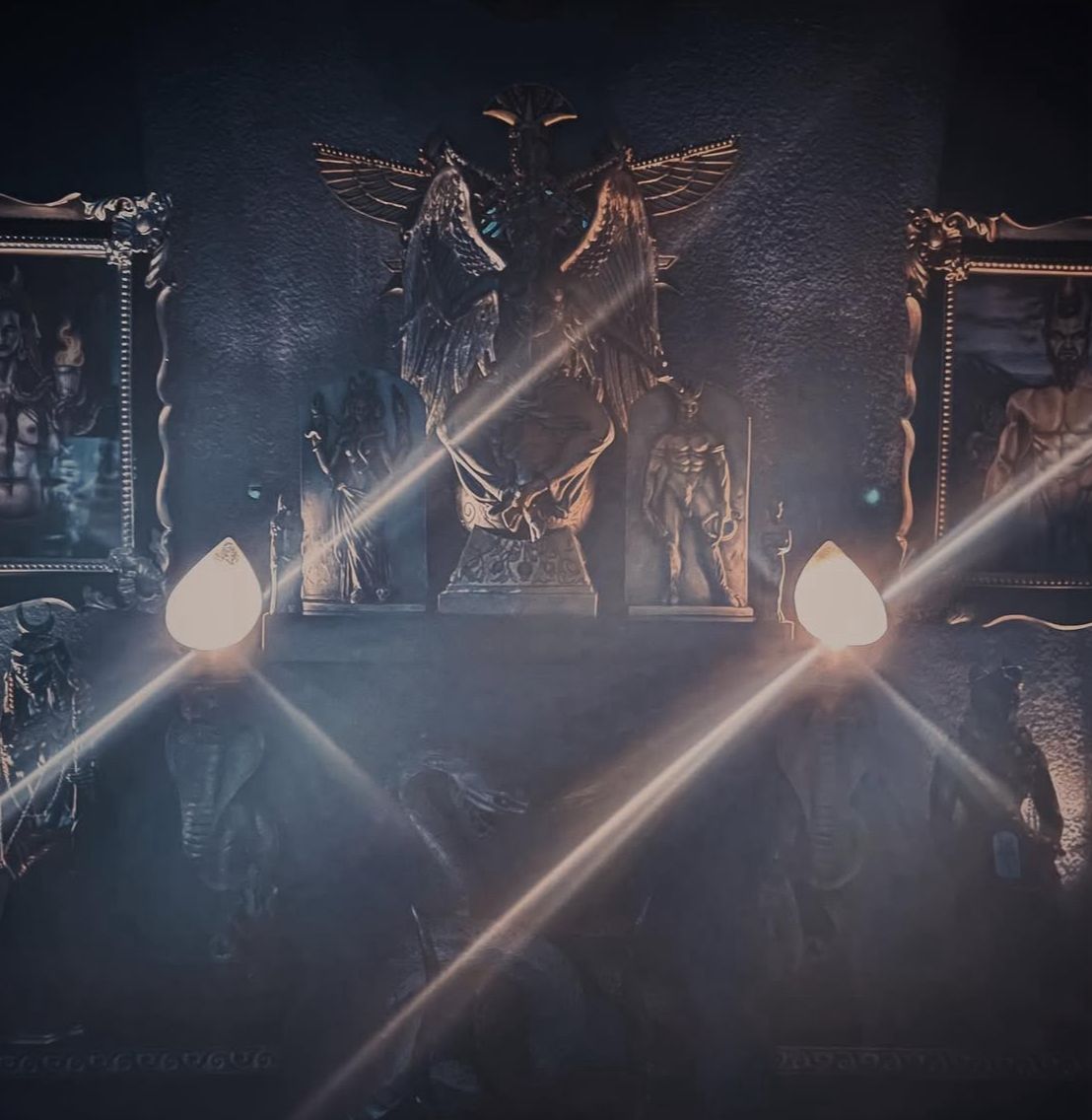 AgnesPsychic's tweet photo. I recently received this stunning 12-inch, Hekate statue as a gift from my friend. Here's a glimpse of how it looks on the wall behind main witchcraft altar, flanked by my patron deities, Hekate and Pan, with Baphomet above them at the center. What do you think of the setup? https://t.co/SOpUQVkJH1