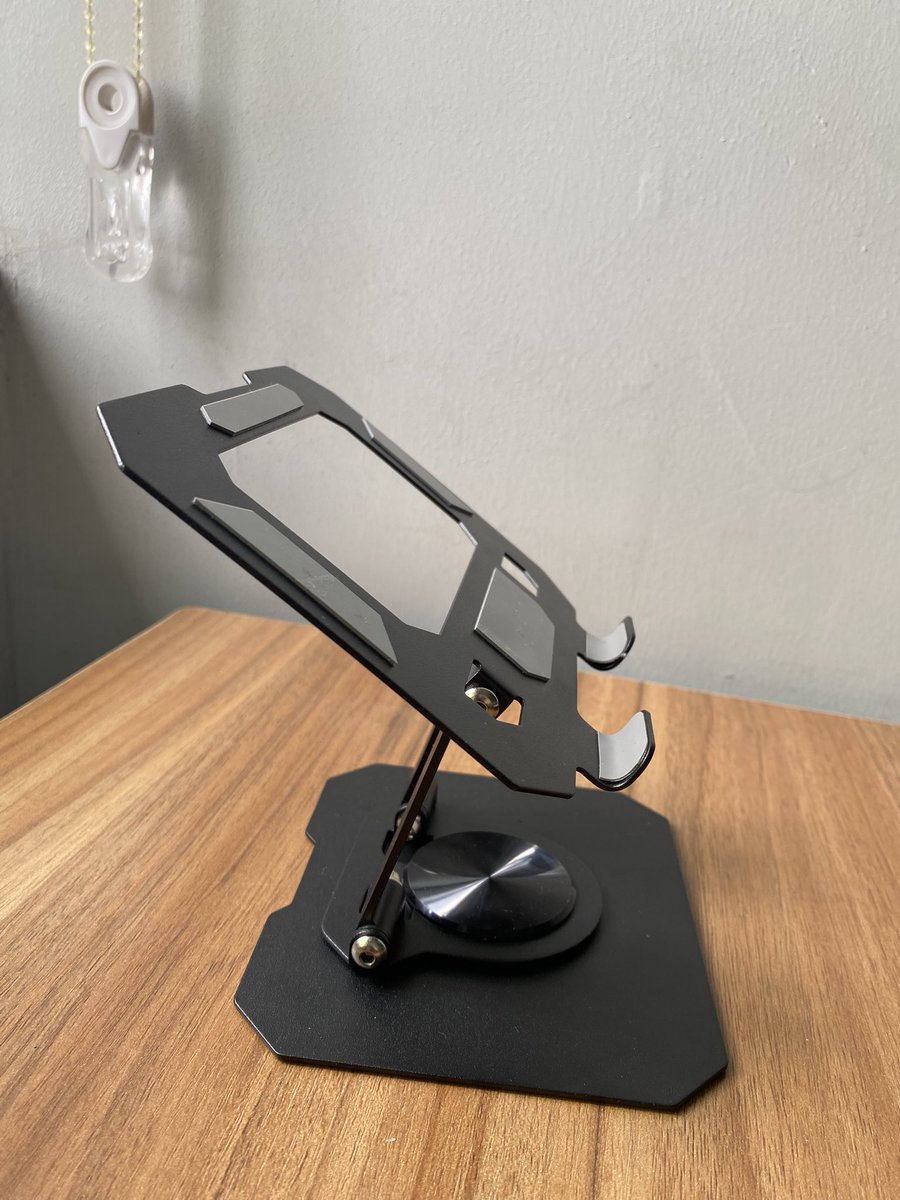 PatrickIqwe's tweet photo. Got this tab stand from Temu mistakenly. 
My intention was a laptop stand. 
It’s up for sale at N15k. 

#tabstand https://t.co/Vmg8xjW7Ic