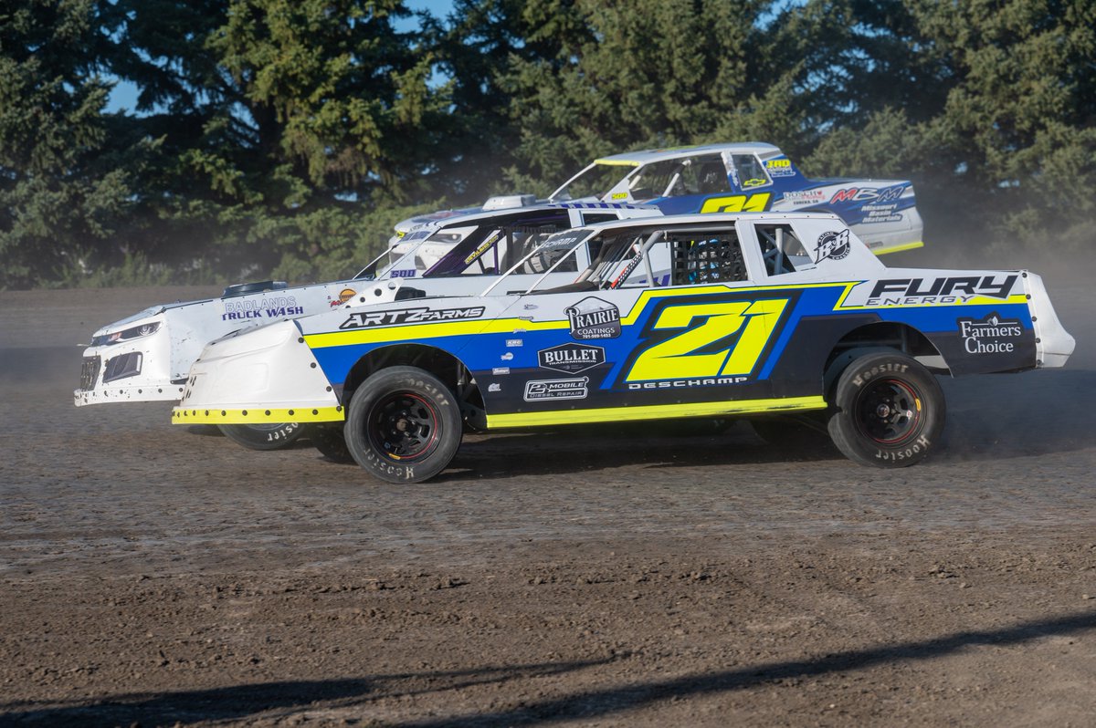 Couldn't think a more a perfect day to post this photo... Only 21 days until our Season Opener on Friday, April 25th!

In this photo, #21D Gabriel Deschamp, #21 Casey Binstock and #21M Matt Dosch race three wide in heat race #1 during last year's Season Opener at Dacotah Speedway