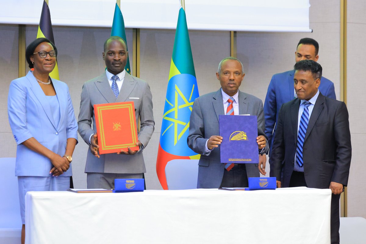 Ministry of Foreign Affairs - Uganda 🇺🇬 (@ugandamfa) on Twitter photo Highlights of the 4th Ethiopia-Uganda JMC: Signing of an MoU on Cooperation in Aviation Training between <a href="/sorotiflyingsch/">SorotiFlying School</a> and <a href="/flyethiopian/">Ethiopian Airlines</a> by Minister of State for Works and Transport <a href="/HonByamukama/">Hon. Byamukama Fred</a> and CEO <a href="/flyethiopian/">Ethiopian Airlines</a> Mr. Mesfin Tasew Bekele. looking on is Deputy Highlights of the 4th Ethiopia-Uganda JMC: Signing of an MoU on Cooperation in Aviation Training between <a href="/sorotiflyingsch/">SorotiFlying School</a> and <a href="/flyethiopian/">Ethiopian Airlines</a> by Minister of State for Works and Transport <a href="/HonByamukama/">Hon. Byamukama Fred</a> and CEO <a href="/flyethiopian/">Ethiopian Airlines</a> Mr. Mesfin Tasew Bekele. looking on is Deputy