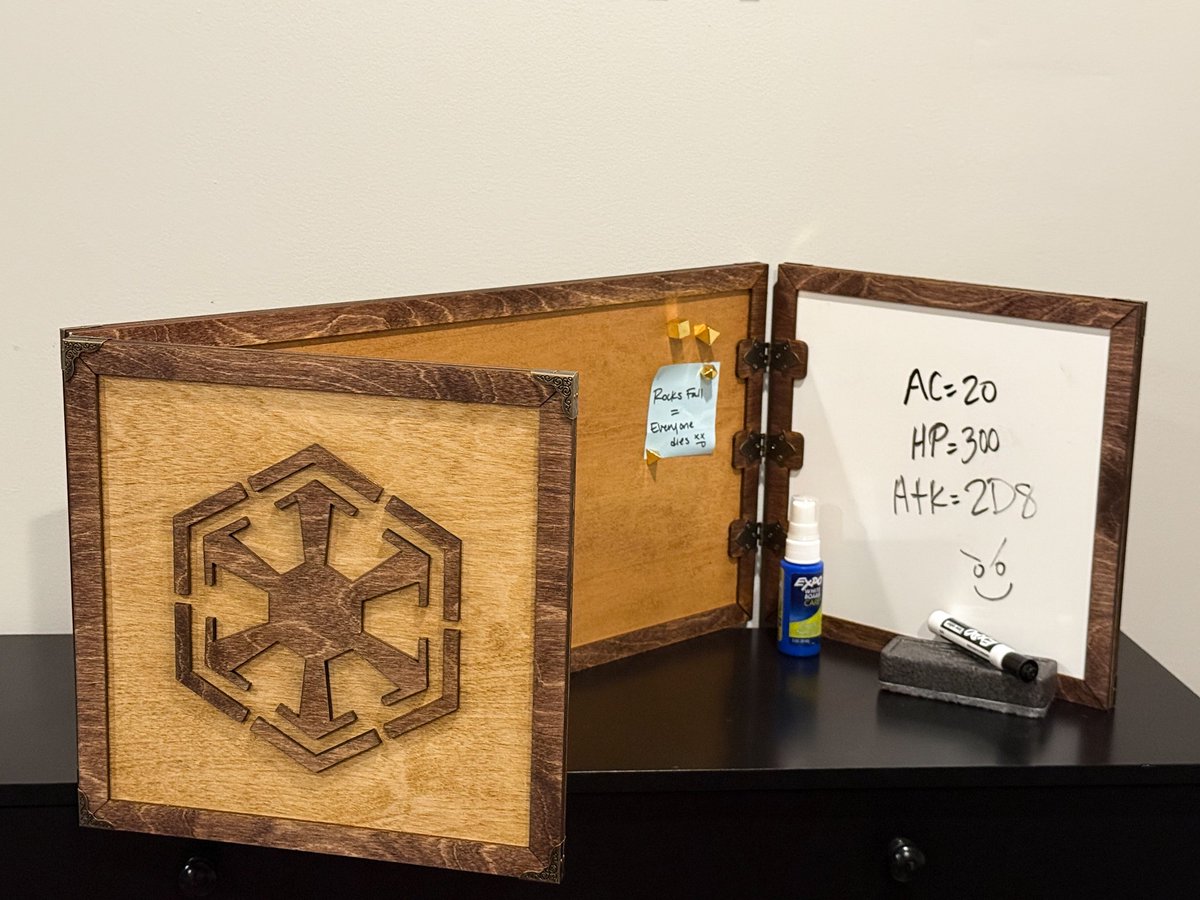 ArcanicArtistry's tweet photo. It's been a long time coming, but we finally finished our first custom dungeon master screen! Our favorite part includes the front panel being fully magnetic, and a whiteboard side panel for taking notes. Let us know what you think!

#dnd #dungeonsanddragons #dmscreen #dnd5e #RPG https://t.co/dEQI0jOKxl